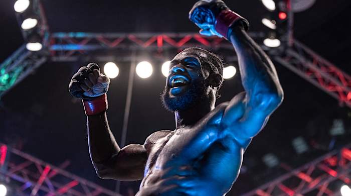 Aljamain Sterling celebrates after defeating T.J. Dillashaw during UFC 280